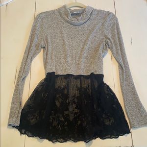 Turtle sweater with lace detailing on the bottom